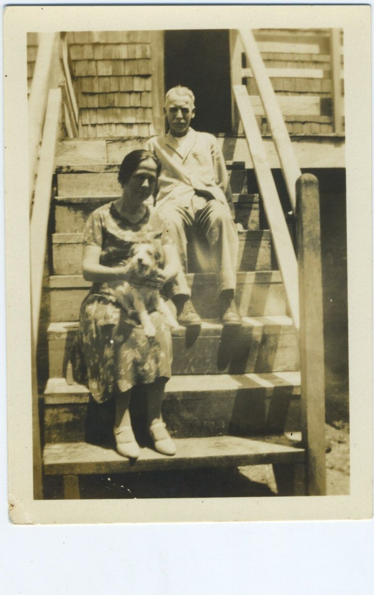On the steps with a dog