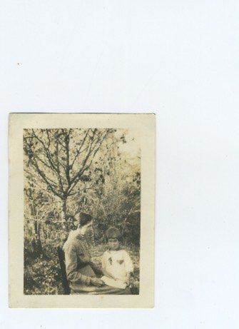 Woman and child in a garden