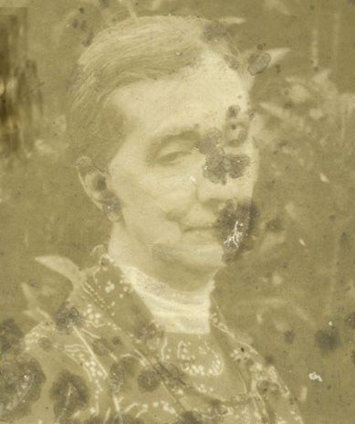 Sarah Ann Miles against tropical foliage (2 of 2)